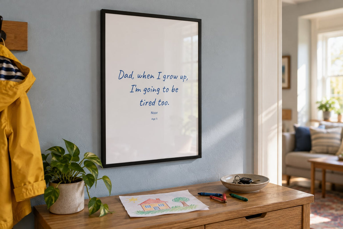 Illustrative product mockup: framed A3 print with a child's funny quote in a family hallway. Not a customer photo.